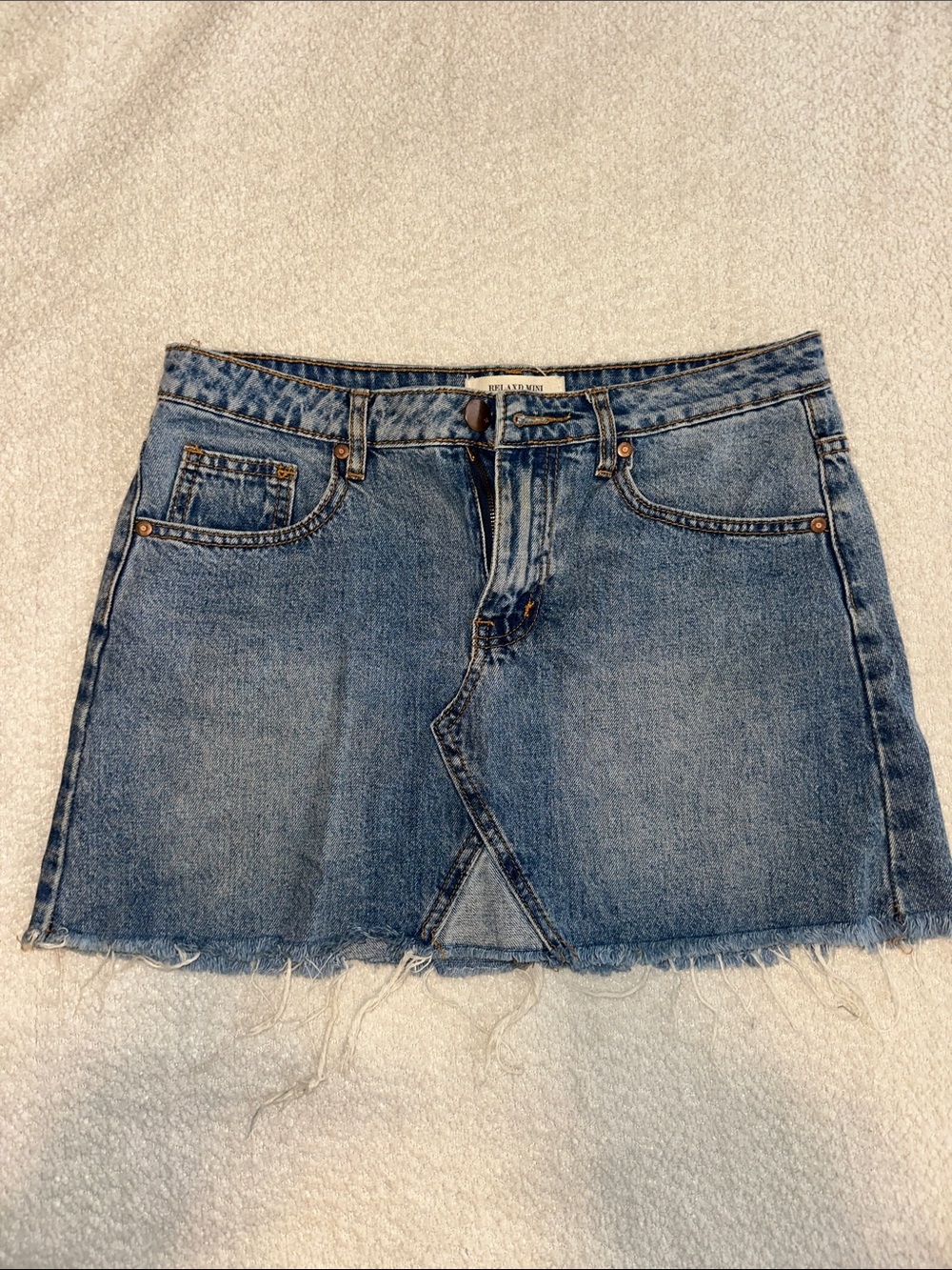 Classic Light Blue Denim Mini Skirt with Frayed Hem